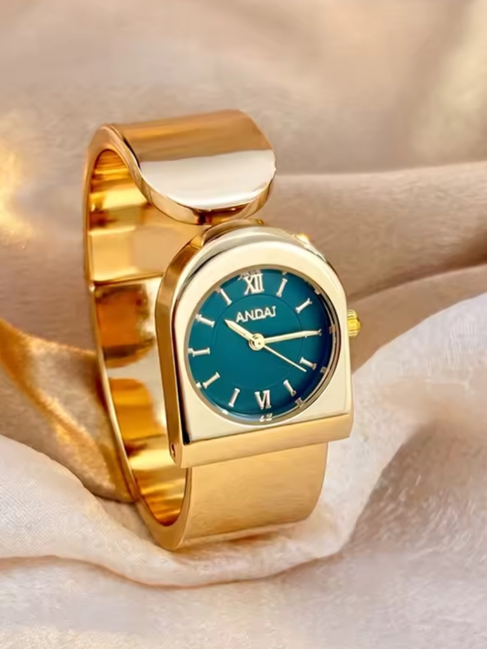 AND Gold-tone Bangle Watch with Teal Dial